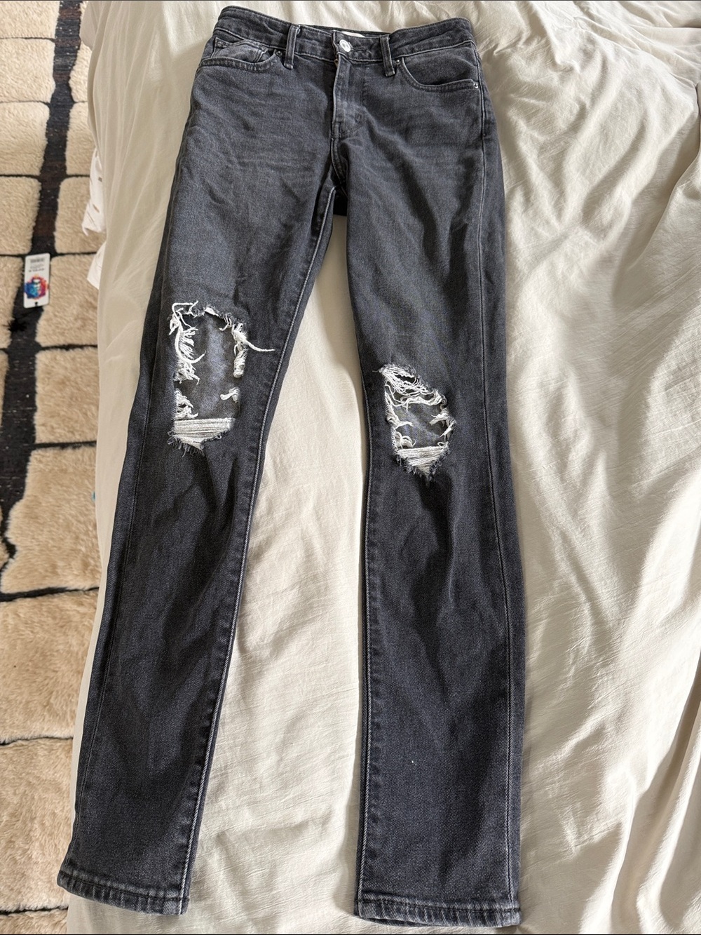 721 high rise skinny Levi's Black Distressed Jeans with Knee Rips